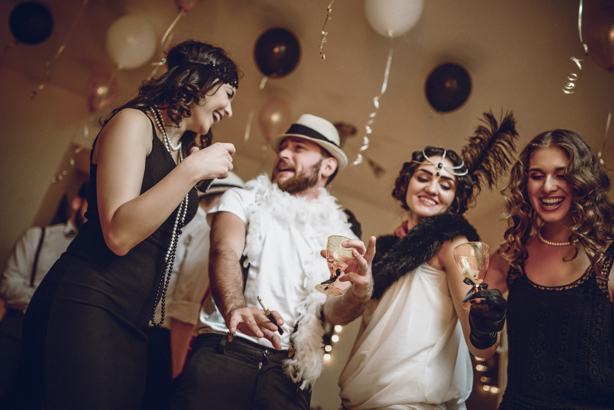 Dancing Group of Smiling Friends Having Great Party at Night