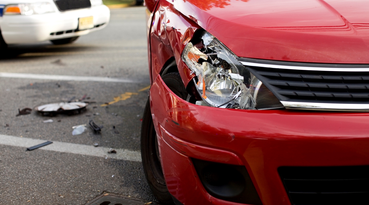 daylight savings time 2023 - front of red car damaged