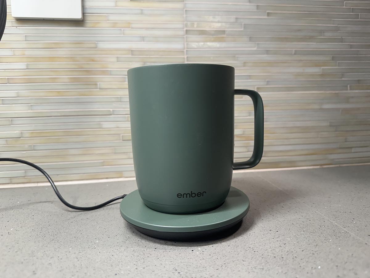 Ember The Ember Mug 2 in sage green on a kitchen counter on its pluggedThe Ember Mug 2 in sage green on a kitchen counter on its plugged-in charging coaster.The Ember Mug 2 in sage green on a kitchen counter on its plugged-in charging coaster.-in charging coaster.Mug 2 Review