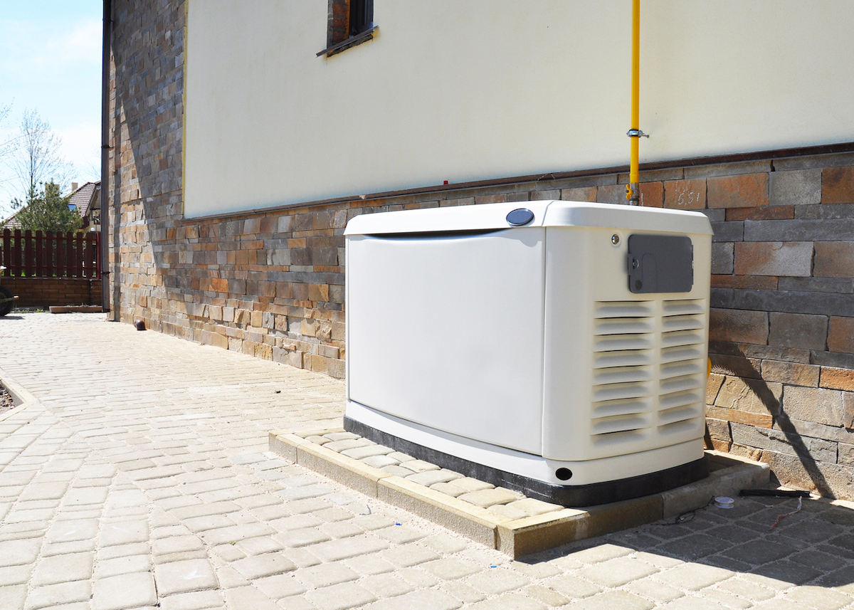 standby generator installed outside of a large home