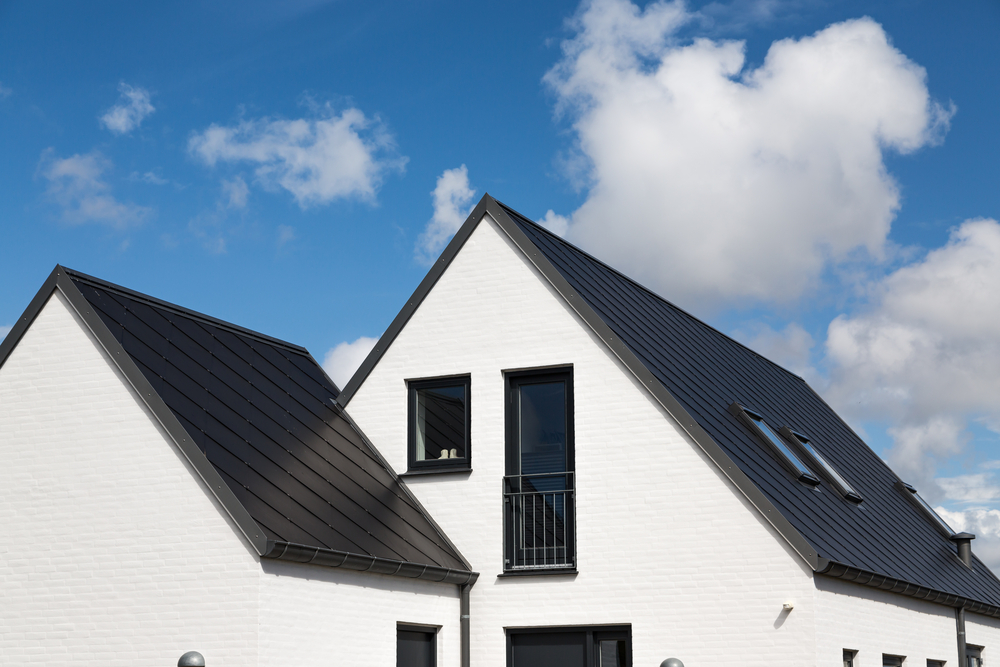 metal roof vs shingles cost