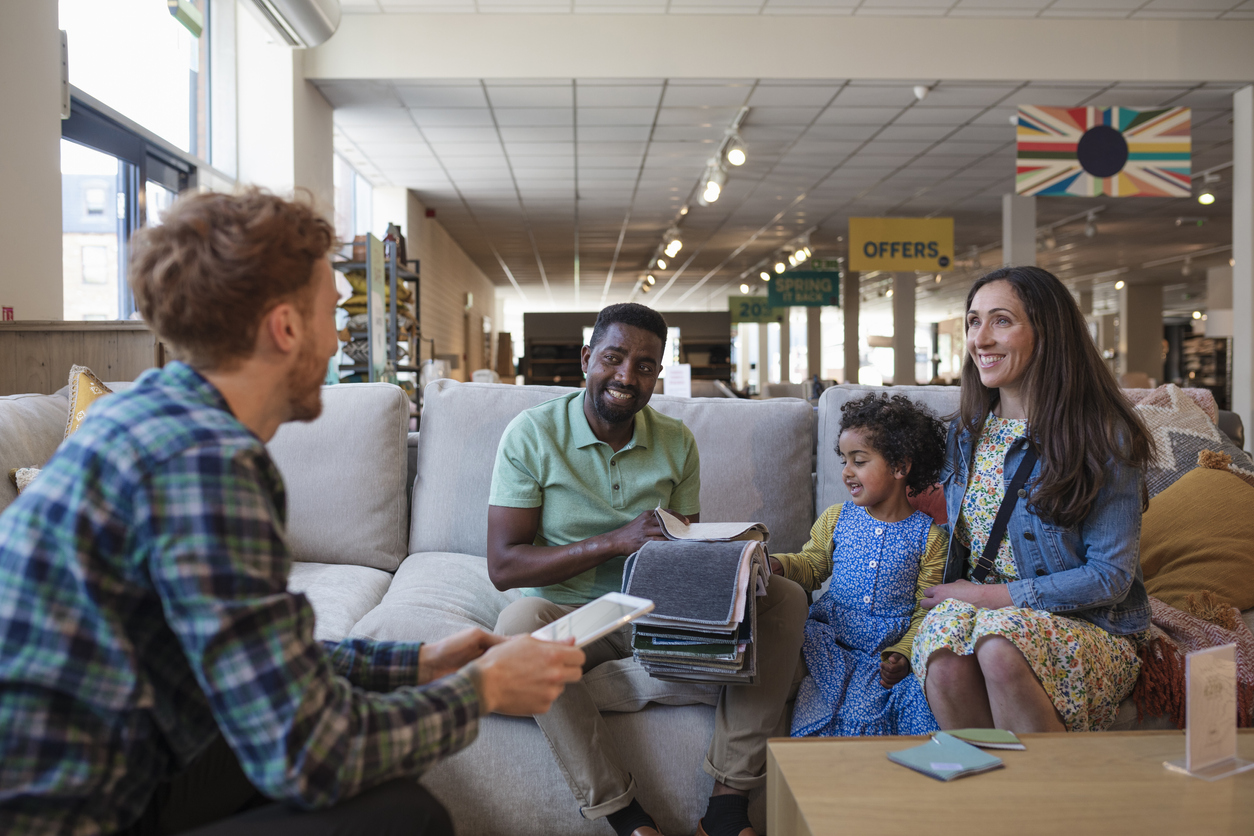 iStock-1350603440 retail interior designers family choosing fabric colors.jpg