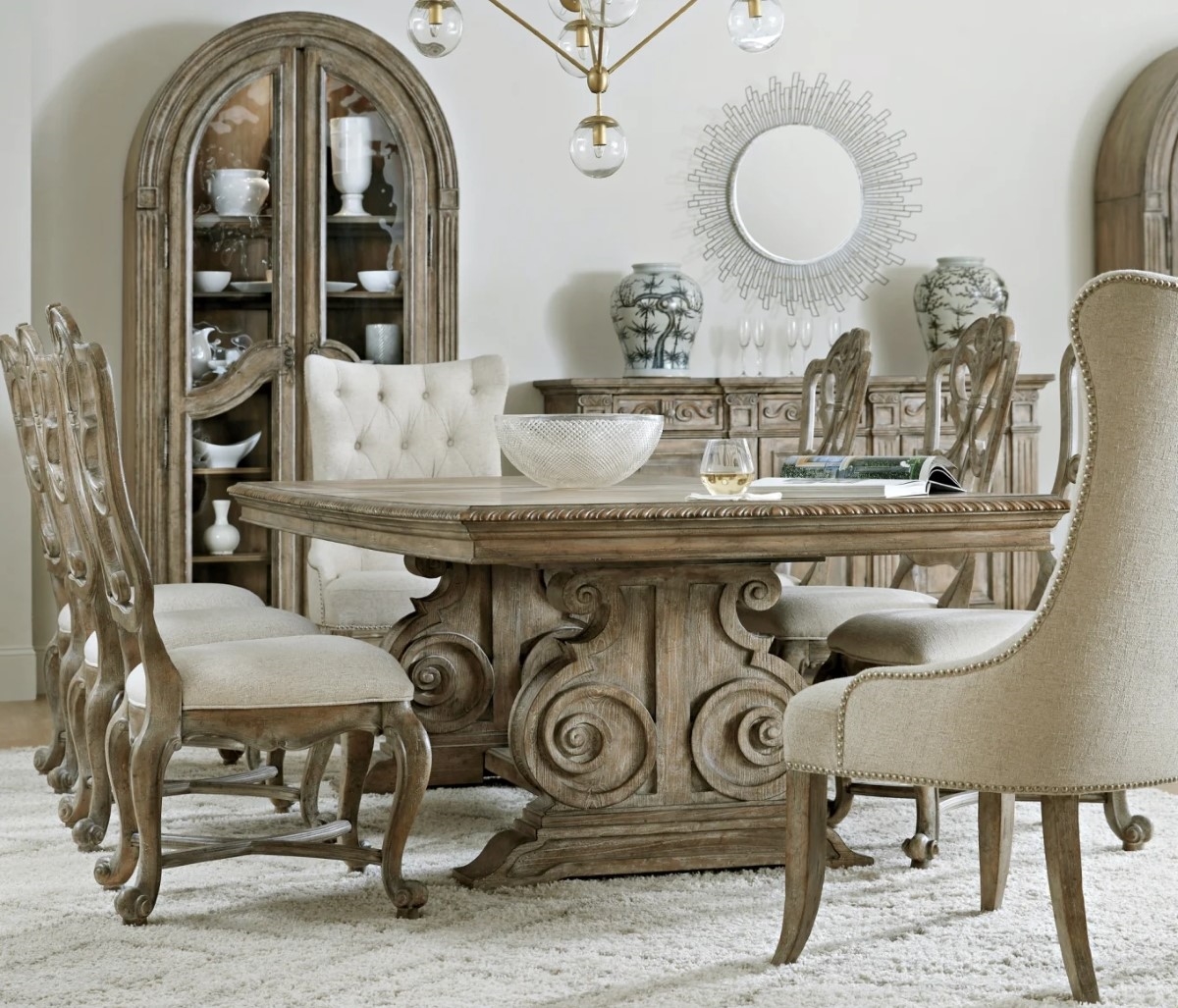 Formal dining room area with large furniture.