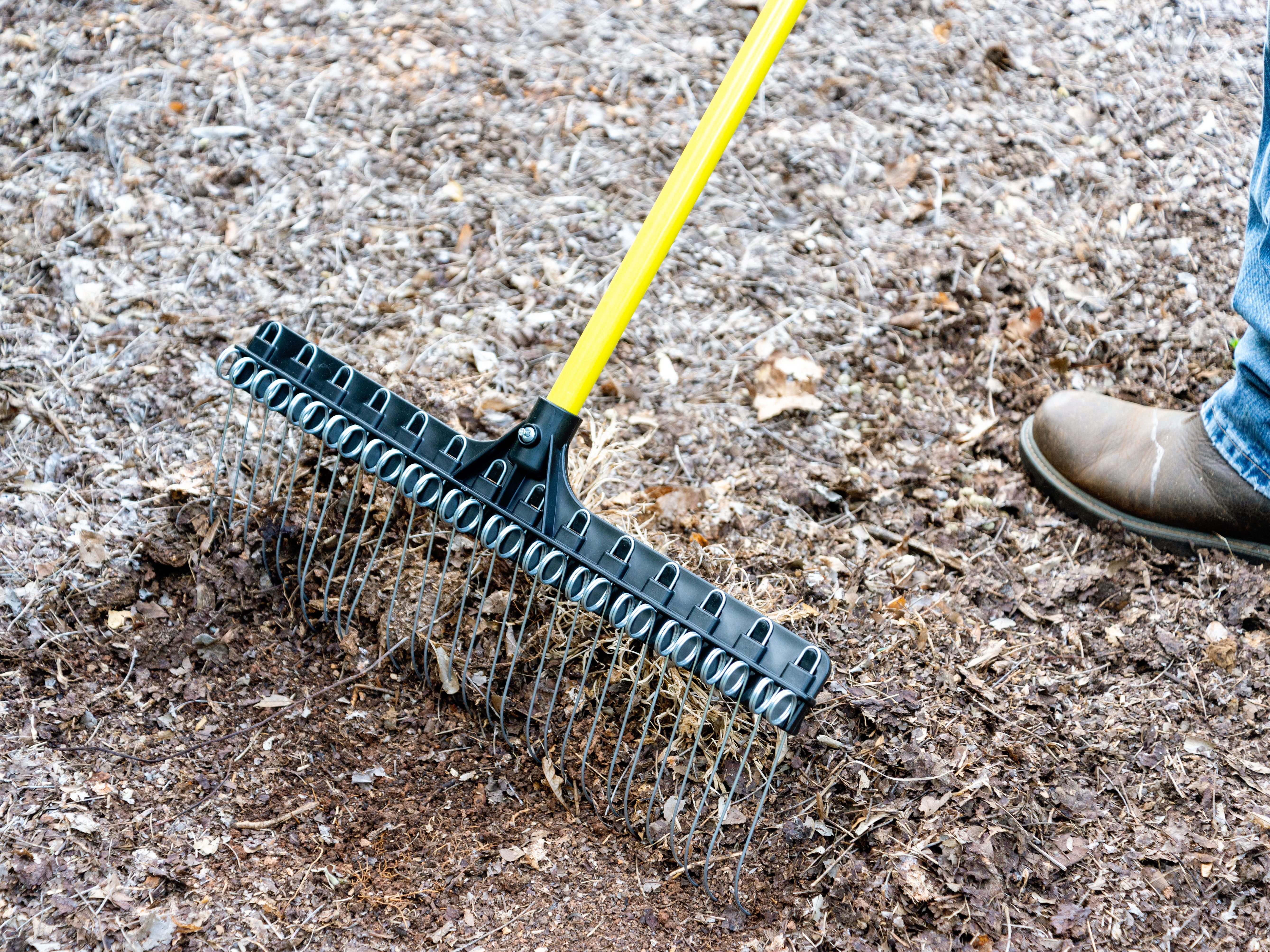 Rake for pine needles being tested  on the ground