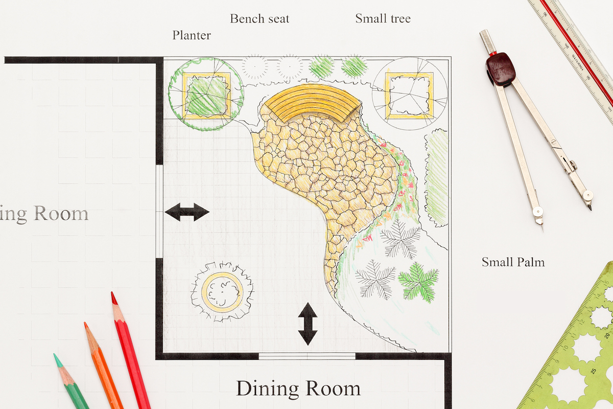 Une illustration d'un aménagement paysager xériscape pour une maison résidentielle.