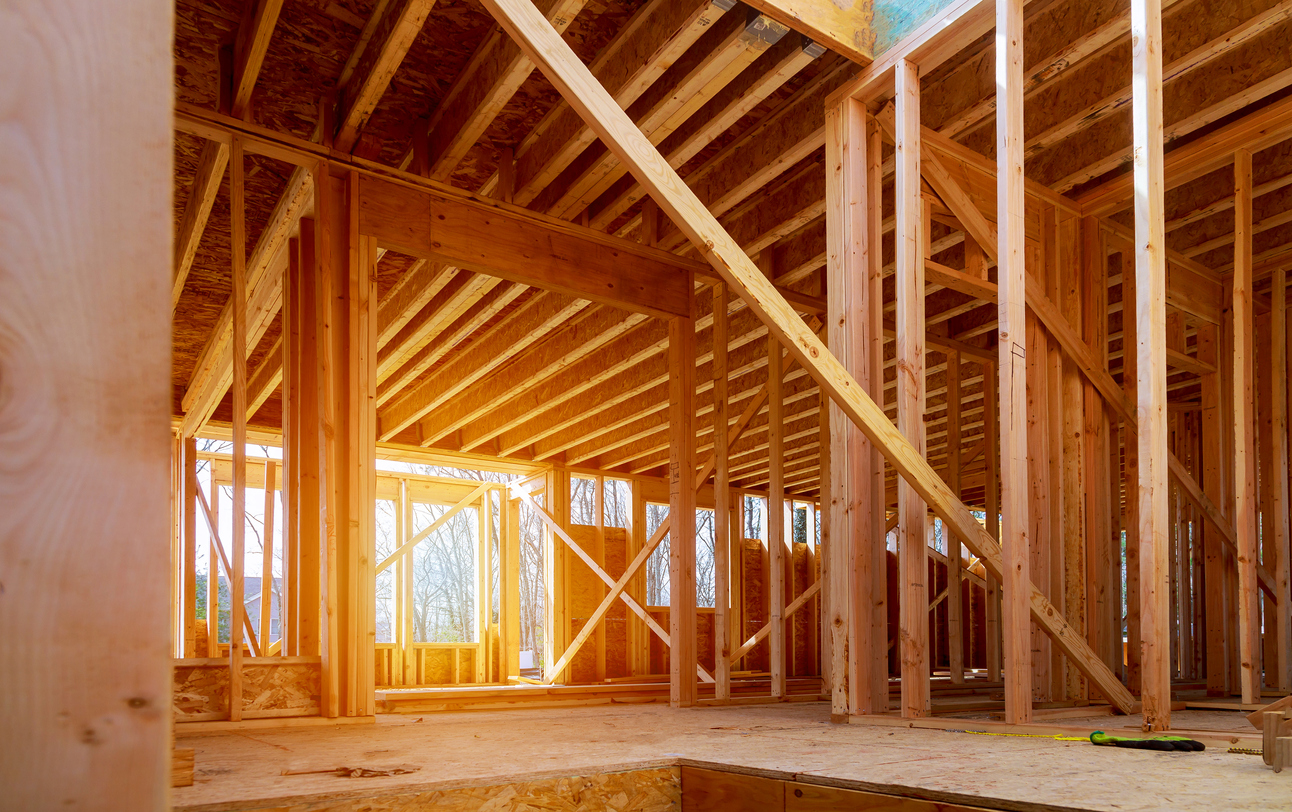 house settling wood frame home under construction