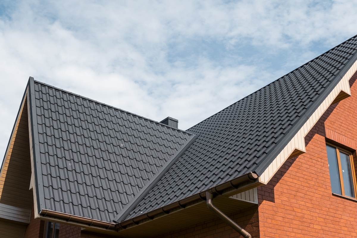 A modern home with a metal roof for resiliency.