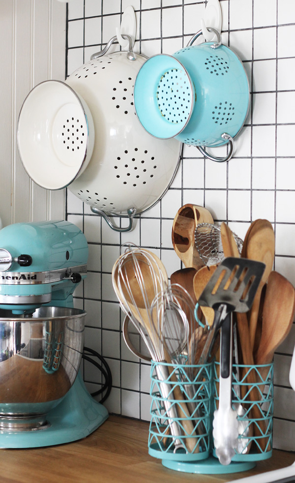 Kitchen utensils hanging on command hooks