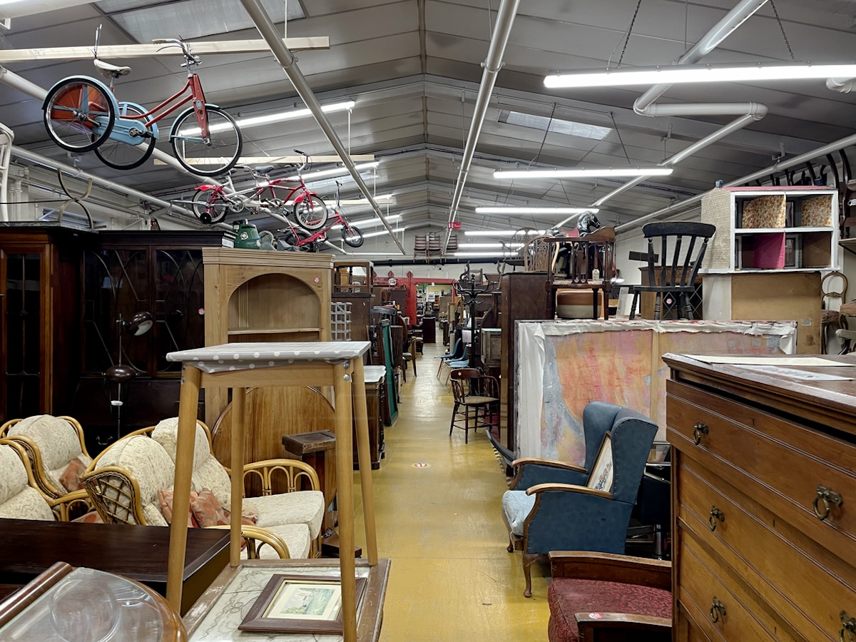 A clean thrift store selling gently used furniture.