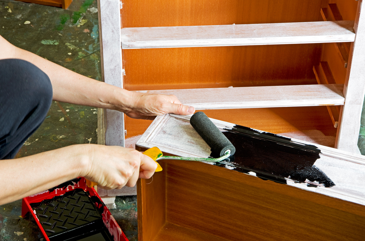 painter with paint roller