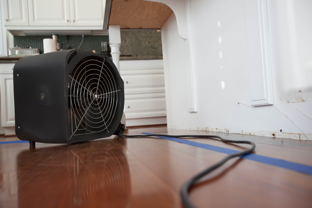 Fan drying out kitchen after a flood or leak