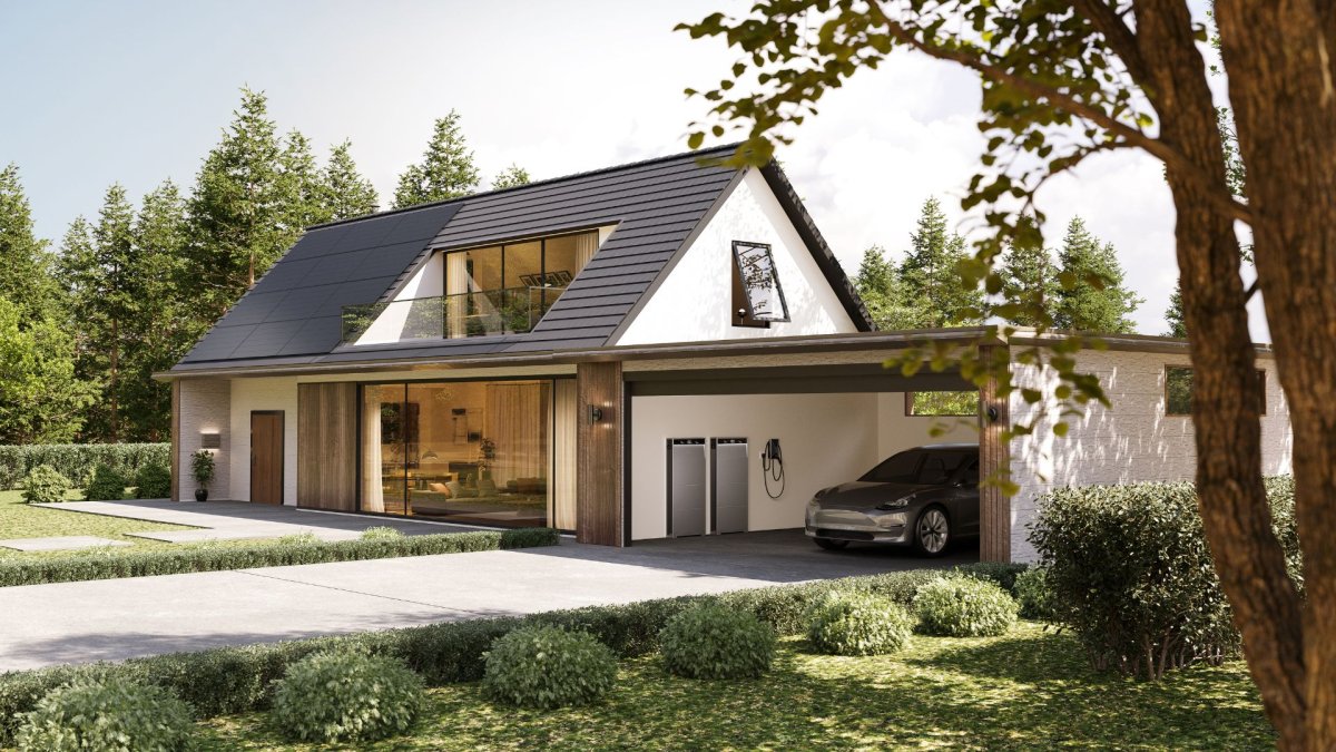 Anker Solix X1 installé dans un garage d'une maison moderne avec des panneaux solaires