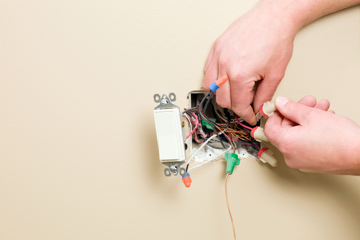 3 way light switch installing wire nut into wall switch box