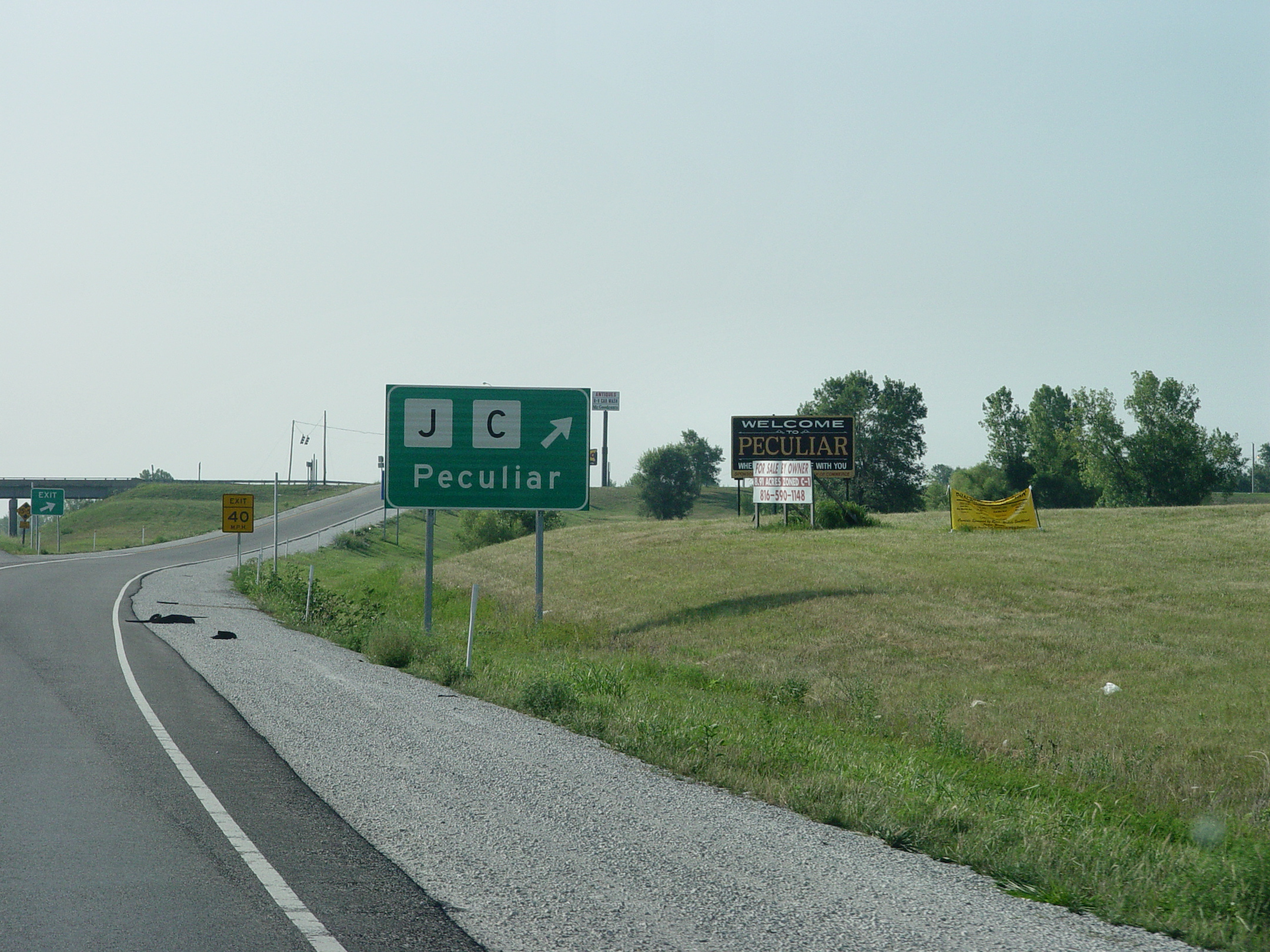 road sign for peculiar missouri