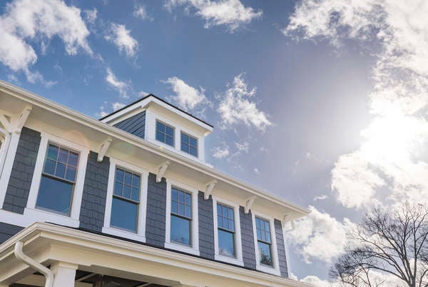 close up of top half of house with long rectangular window