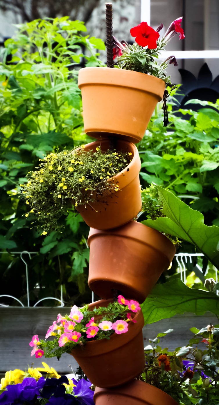 13 belles idées de pots de fleurs DIY pour votre porche ou votre jardin