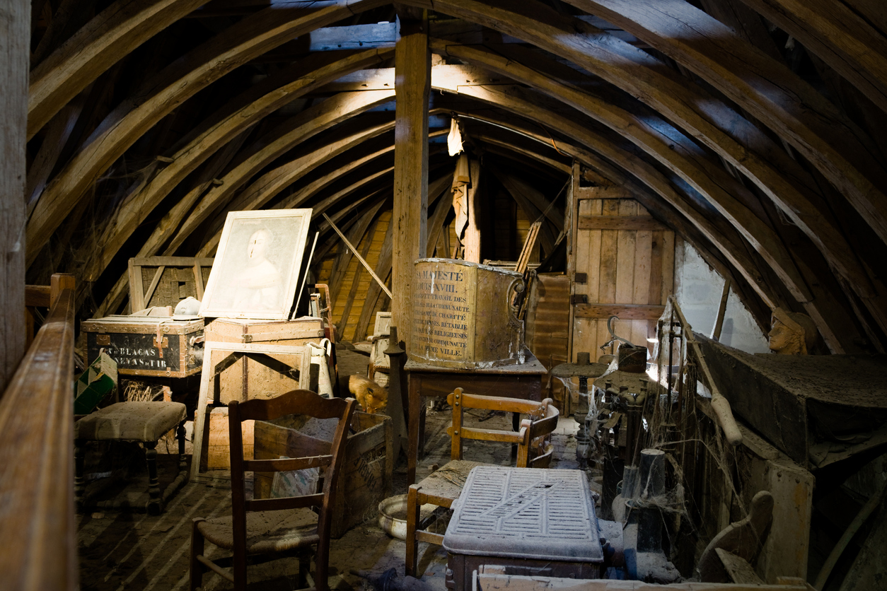 Beautiful loft space with a collection of antique home furnishings.