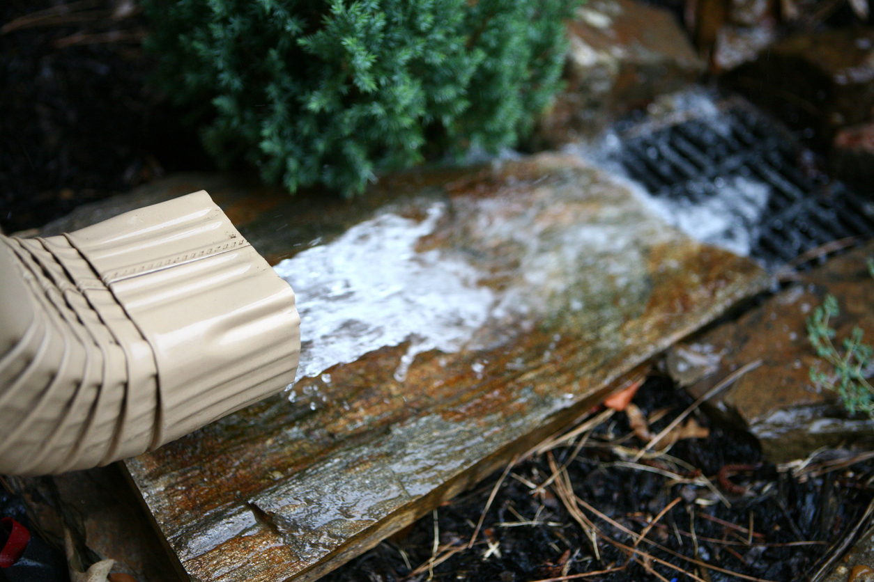 iStock-157608041 what is a cistern rainwater coming down gutter