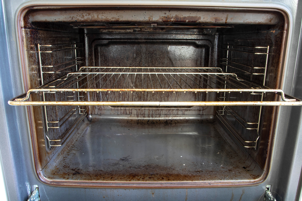 Interior shot of dirty oven.