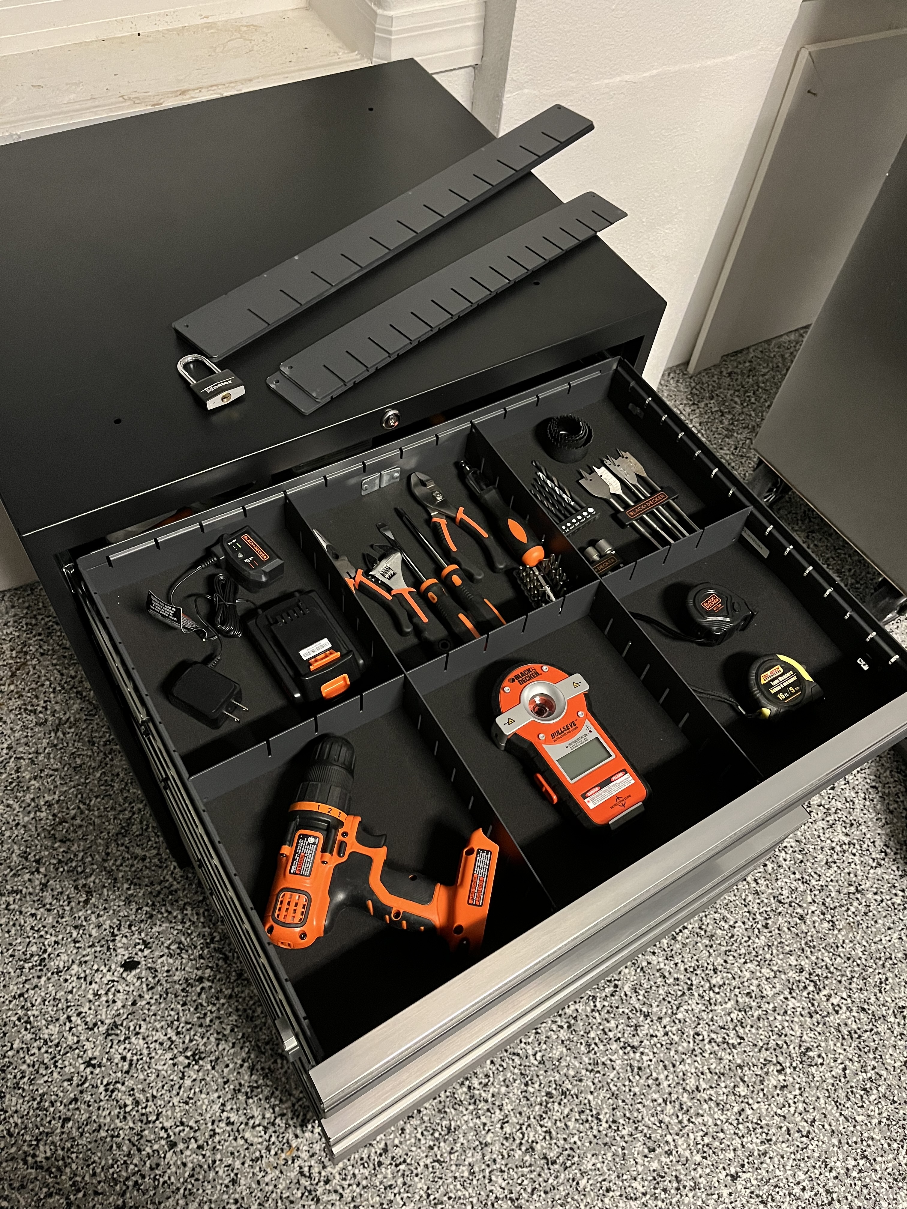 THe NewAge Pro Series 5-Drawer Tool Cabinet stocked with tools during testing.