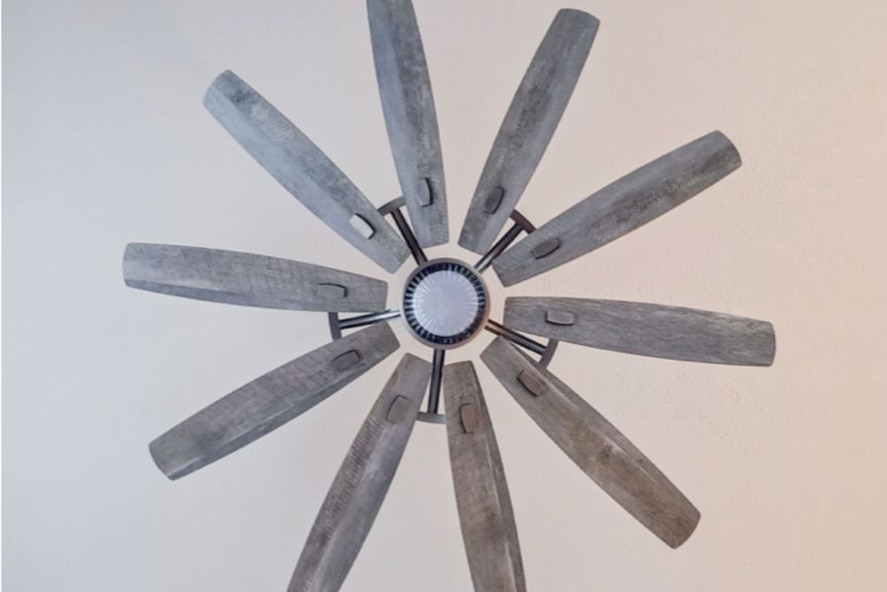 The rustic Barn by Minka-Aire ceiling fan installed on a ceiling for testing.