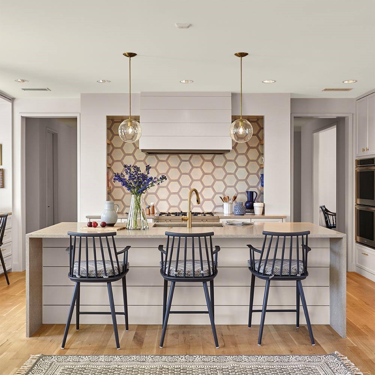 A kitchen with a warm neutral colored painted ceiling.