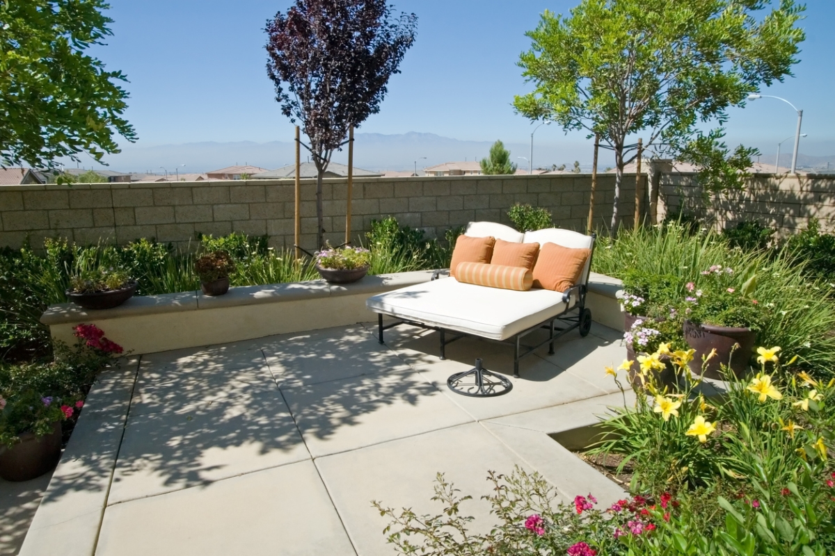 Outdoor patio with flower garden