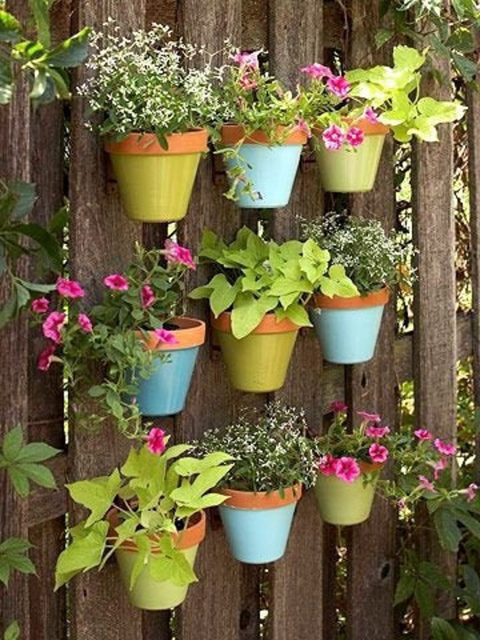 13 belles idées de pots de fleurs DIY pour votre porche ou votre jardin