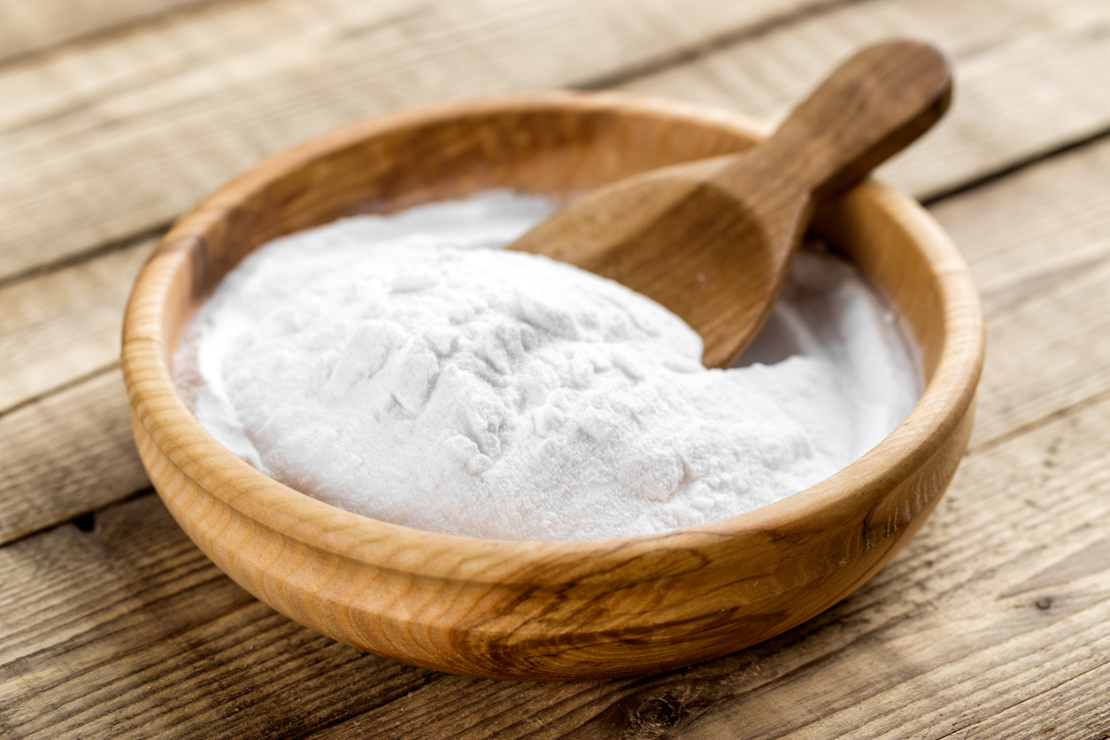 wooden bowl full of baking soda