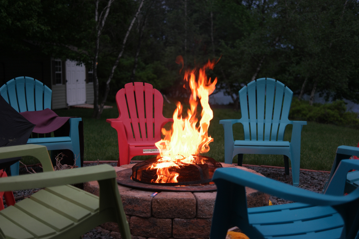 iStock-652879764 2023 bob vila editors picks chairs around a fire pit