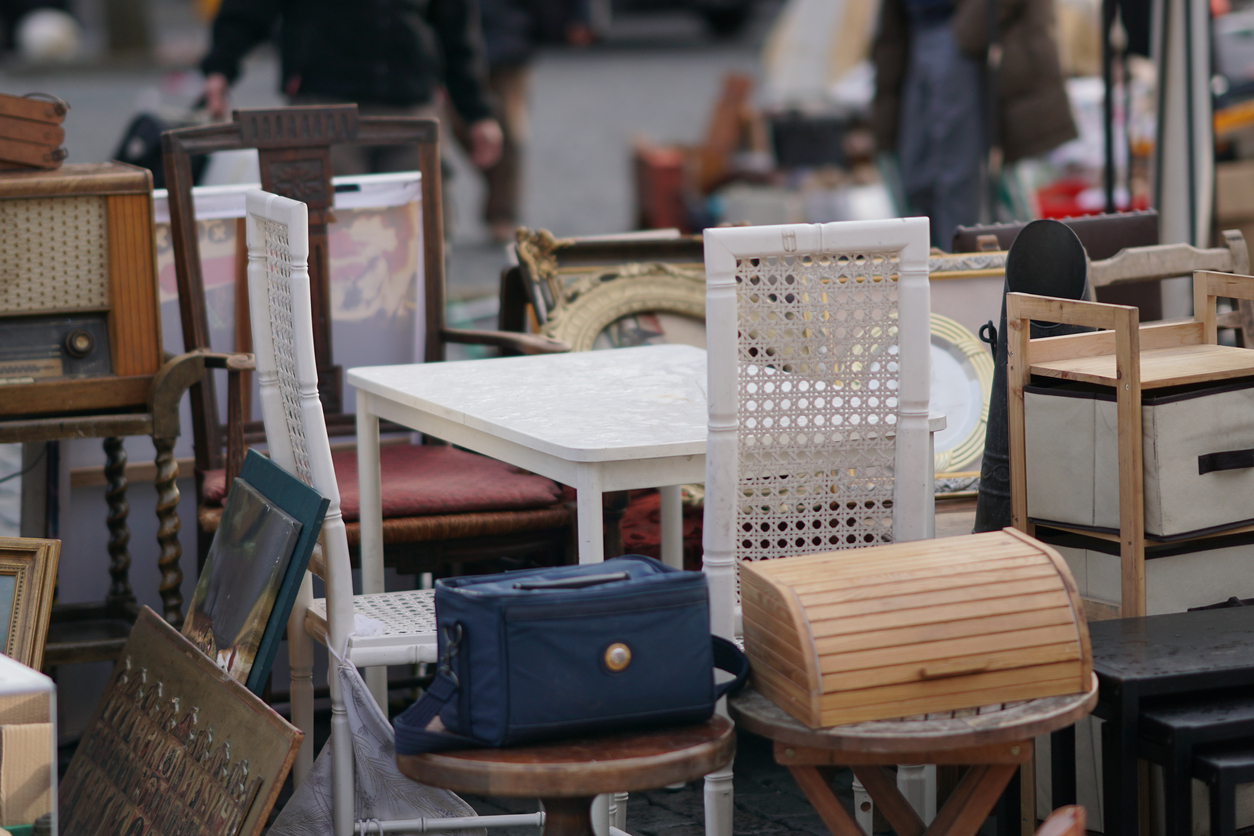 A collection of furniture at a thrift store.