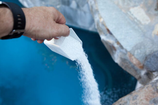 Pouring Baking Powder into the pool