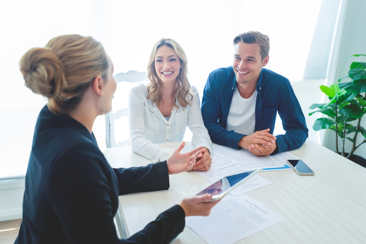 Couple meeting with realtor