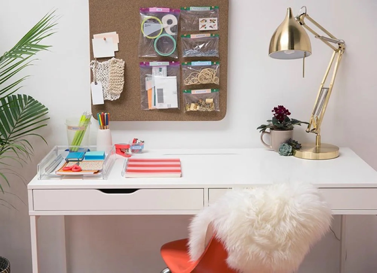 Desk with plastic bags with supplies on board.