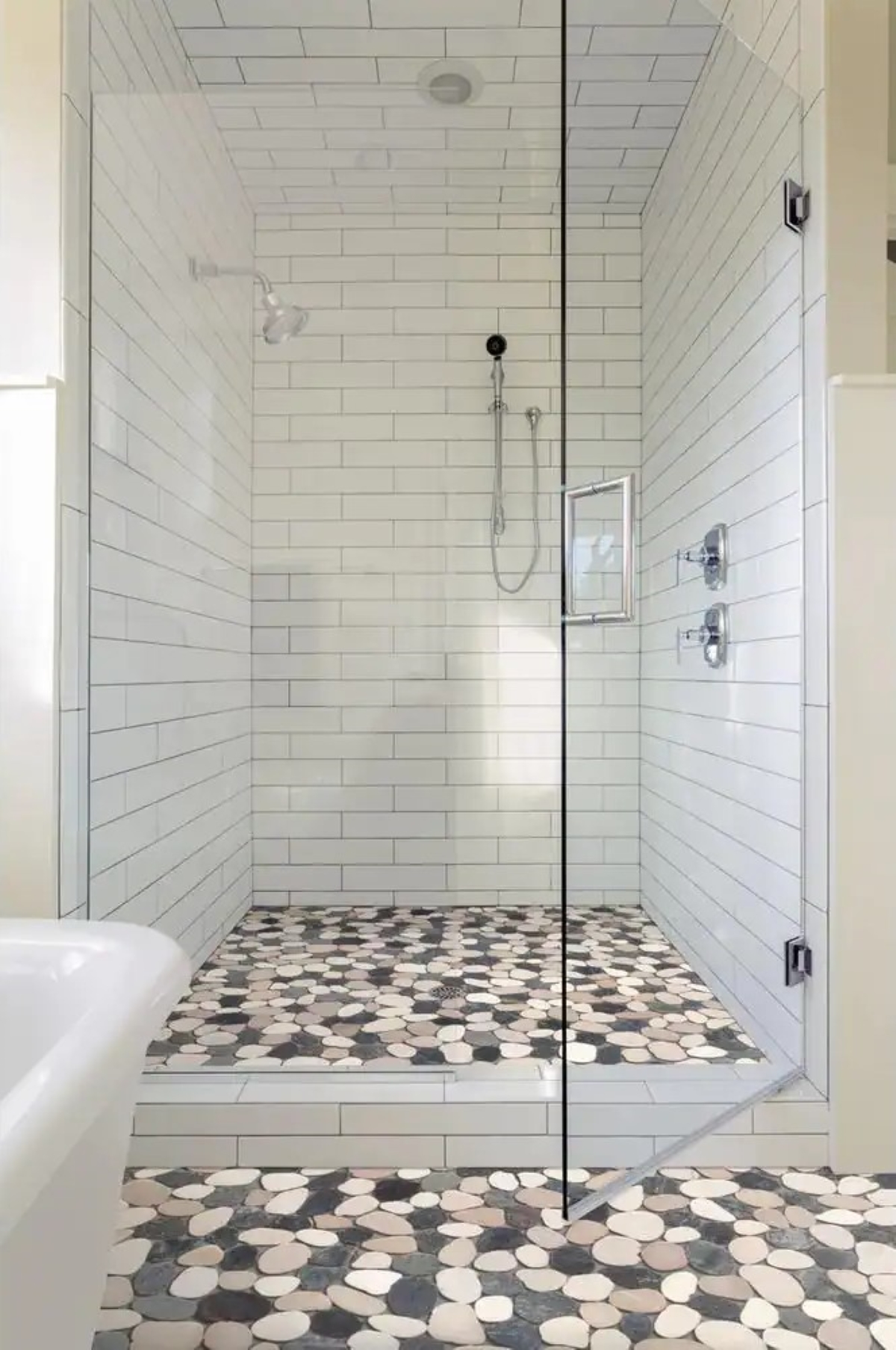 Subway and stone bathroom tiles