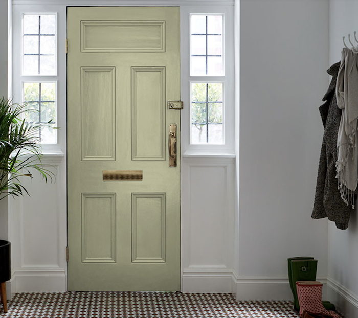 Doorway painted in "Viridis" paint color with checkered tile.