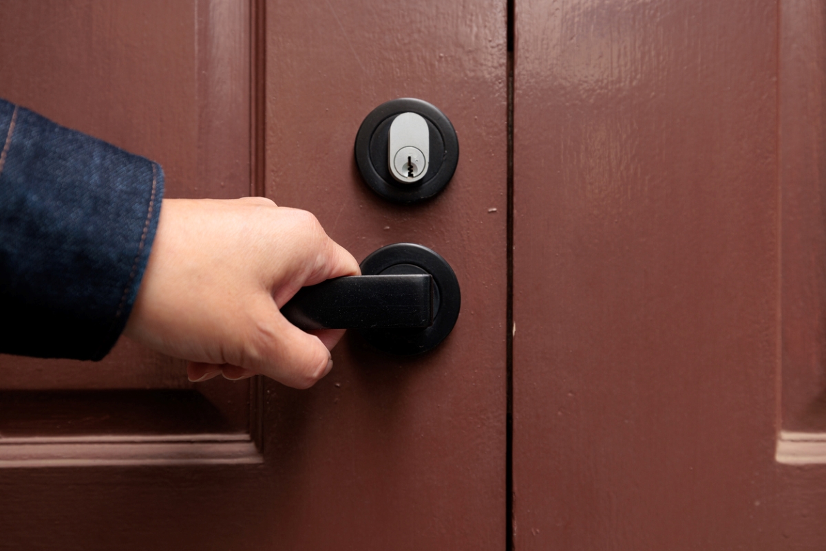 Hand on door handle