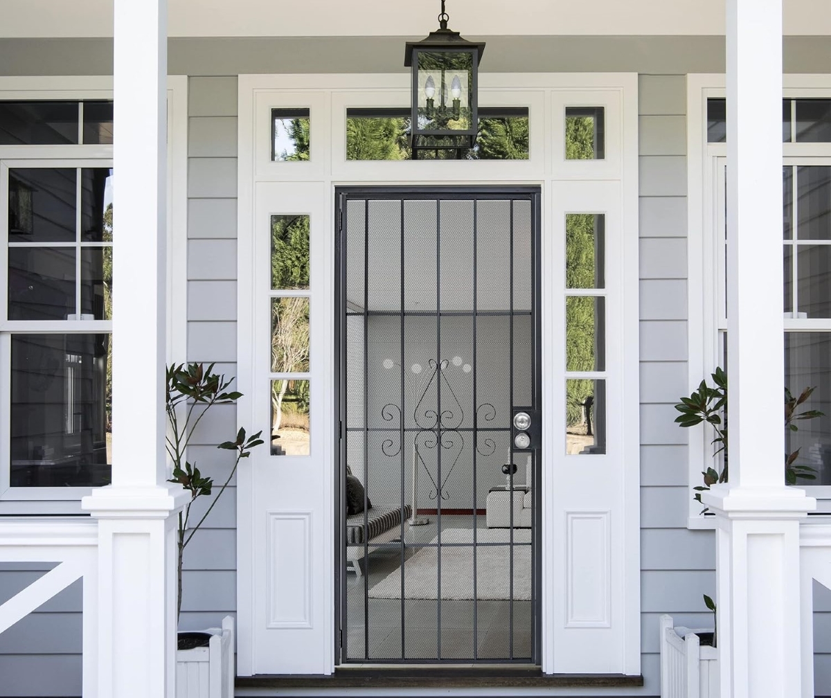 Front door with metal security screen door.